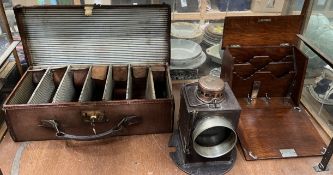 A Welch Patent railway signalling lamp together with an oak stationery cabinet and a shotgun