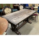 An oak refectory table together with a pair of shield back chairs,