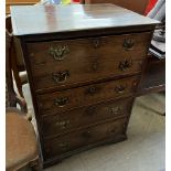 A 19th century oak secretaire chest with a rectangular top above a double drop down drawer front