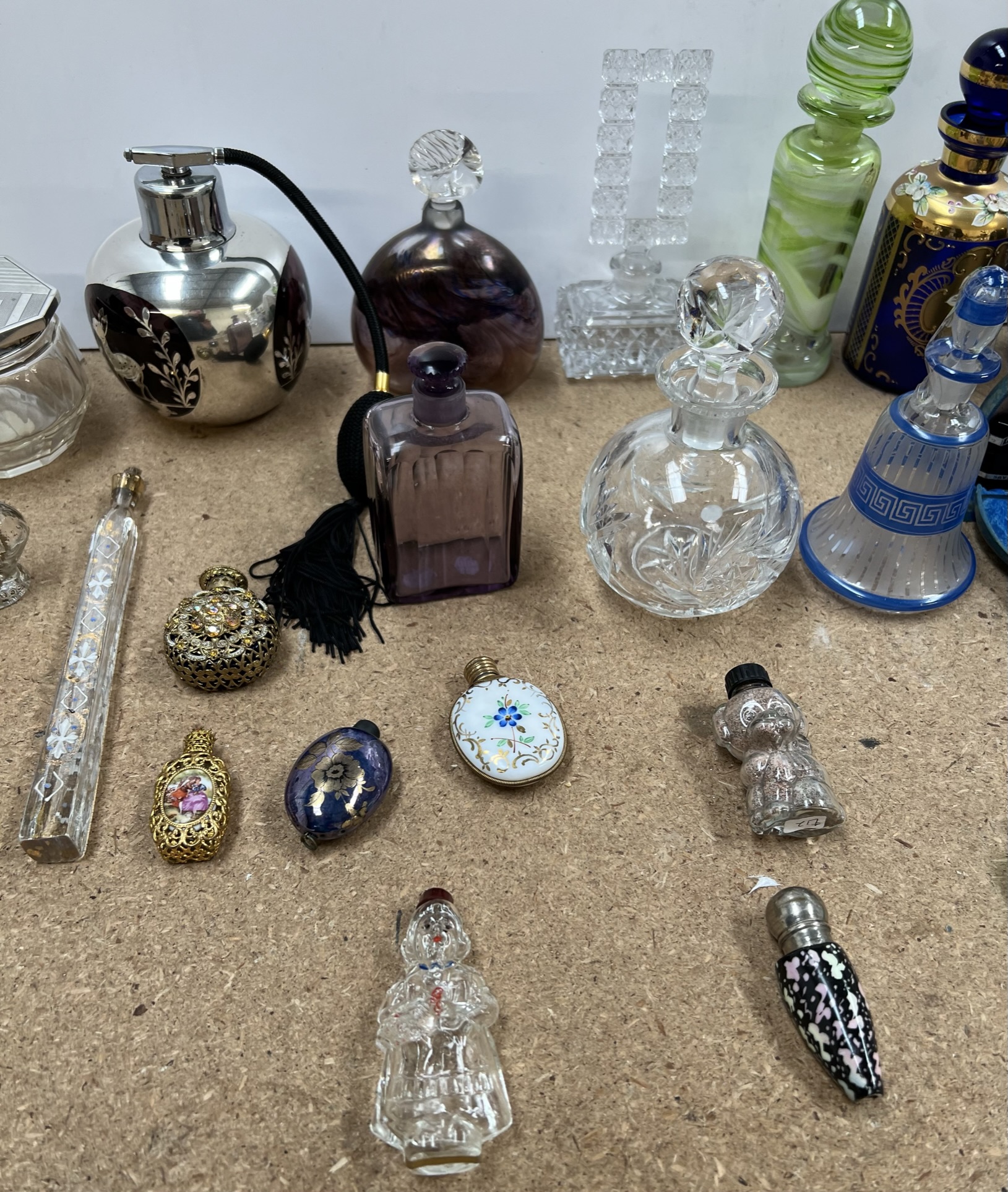 A silver and enamel top atomiser, together with a collection of scent bottles, - Image 3 of 4