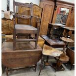 A 20th century oak gateleg dining table together with an oak elbow chair,