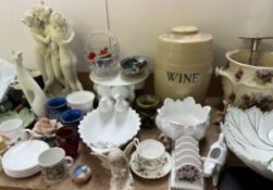 A stoneware Wine storage container together with pottery leaf dishes,