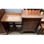 An Edwardian mahogany music cabinet with six drawers with drop fronts on square legs together with