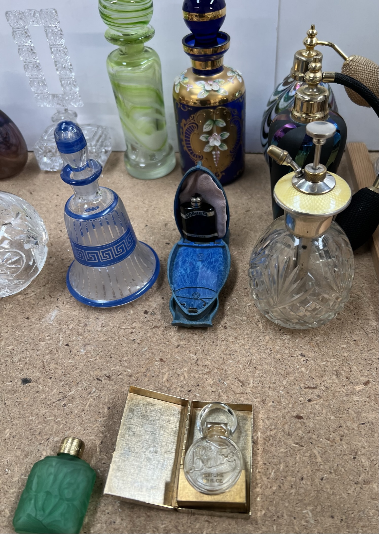 A silver and enamel top atomiser, together with a collection of scent bottles, - Image 2 of 4