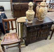 An oak Dutch dresser base together with a pottery twin handled vase, pottery jug,