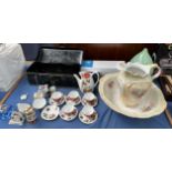 A tin box with Rolls Royce transfer together with a jug and basin set, part coffee set,