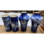 A pair of Royal Doulton blue and white vases transfer decorated with children seated under a tree,