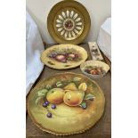 An Aynsley Orchard Gold plate, D Jones together with two similar dishes,