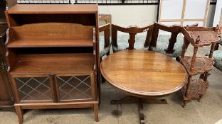 A brass inlaid corner whatnot together with an oak coffee table and two bookcases