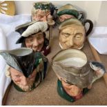 Six assorted Royal Doulton character jugs including the Poacher D6429, Robin Hood D6527,
