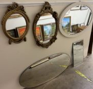 A cream painted wall mirror together with four other wall mirrors