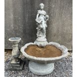 A reconstituted stone fountain with maiden surmount together with a reconstituted stone pedestal