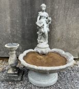 A reconstituted stone fountain with maiden surmount together with a reconstituted stone pedestal