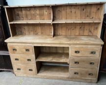 A pine dresser, the rack with two shelves,