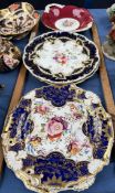 A set of three 19th century floral decorated plates together with a pair of floral decorated plates