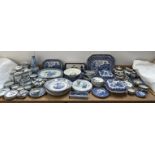 Assorted blue and white pottery including part tea sets, meat plates, bowls, tureens and covers,