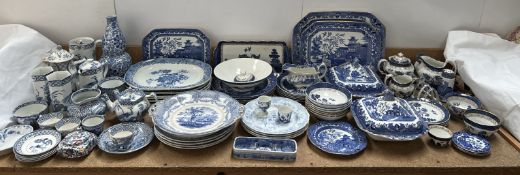 Assorted blue and white pottery including part tea sets, meat plates, bowls, tureens and covers,