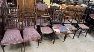 A set of four Edwardian mahogany salon chairs together with a pair of carved oak dining chairs,