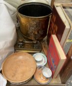 A brass coal bucket together with a brass desk standish, brass horse hames, treen bowl,