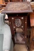 An Anglo Indian jardiniere of square form inlaid with mother of pearl with turned decoration