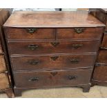 A 19th century mahogany chest of drawers with a rectangular top above two short and three long