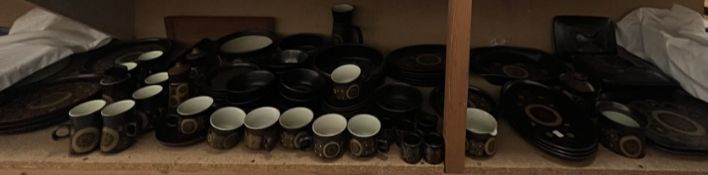 An extensive Denby stoneware part tea and dinner service in browns with concentric circle