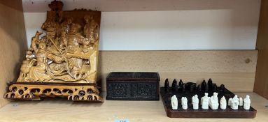 A Chinese carved panel together with a Past Times chess set