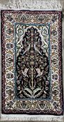 A silk Kayseri wall hanging rug, 75 x 43.
