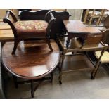 An oak gateleg dining table together with an oak tea trolley.