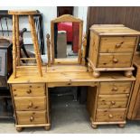 A pine dressing table together with a pine bedside chest,