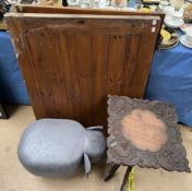 An elephant foot stool together with a carved folding table and a stable door