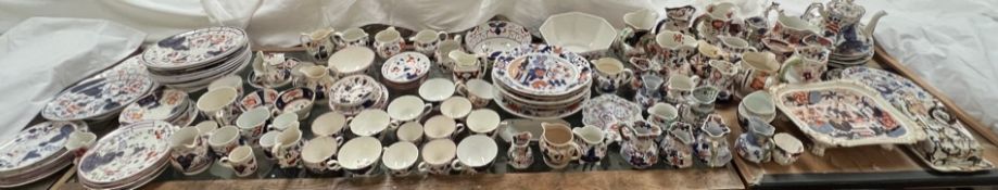 An extensive collection of Gaudy Welsh pottery including jugs, cups and saucers,