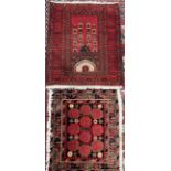 An Iranian Sirjan wool mat with a blue ground and geometric patterns,