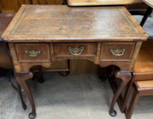 An 18th century and later walnut low boy,