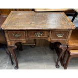 An 18th century and later walnut low boy,