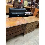 An oak grandmother clock together with an oak sideboard and an oak effect side cabinet