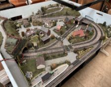 A model railway layout, with stations, buildings,