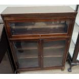 A mahogany sectional bookcase, with an up and over glazed door,