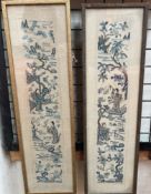 A pair of Japanese embroidered panels depicting figures in a landscape