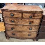 A 19th century mahogany chest of bowed form with two short and three long graduated drawers on