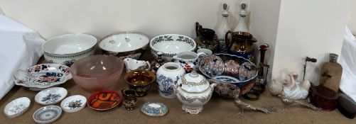 A Japanese Imari bowl together with pottery and glass bowls, copper lustre jugs, Poole pottery dish,