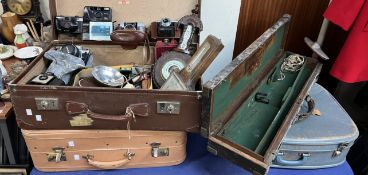 A Nikon 35mm camera together with a collection of cameras, camera equipment, suitcases,