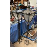 A pair of freestanding lanterns