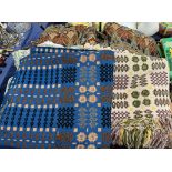 A Welsh blanket with a blue ground and geometric pattern together with another Welsh blanket with a