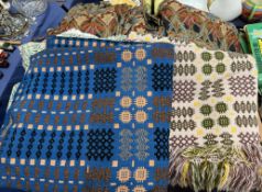 A Welsh blanket with a blue ground and geometric pattern together with another Welsh blanket with a