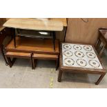 A mid 20th century teak coffee table and nest of two tables together with a tiled top coffee table