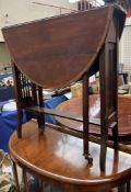 An Edwardian mahogany Sutherland table together with a walnut display cabinet, mahogany sideboard,