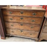 An 18th century oak chest with a rectangular top above four long graduated drawers on bracket feet,