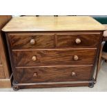 A Victorian mahogany chest with a rectangular top above two short and two long drawers on flattened