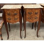 A pair of marquetry inlaid bedside chests with marble tops and two drawers on shaped legs and sabot